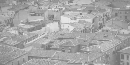 top view black and white image of a dense housing area