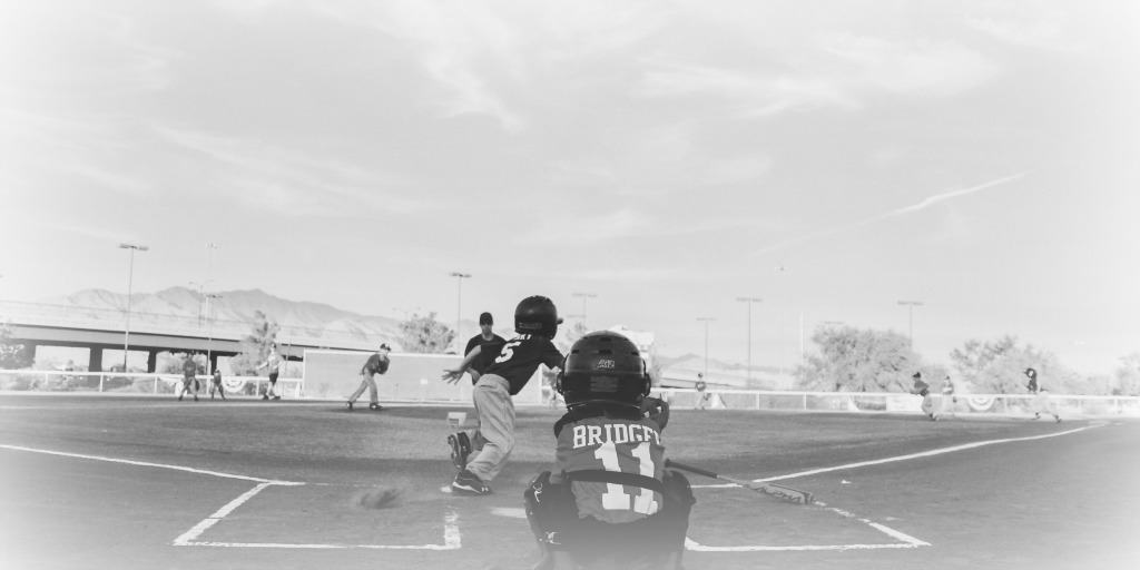 a young baseball player at bat