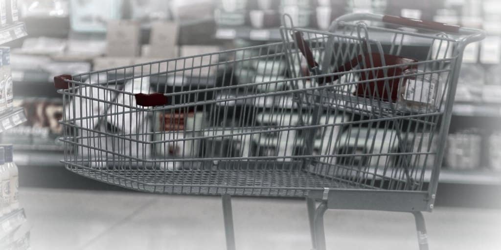 grocery cart in an aisle of a store