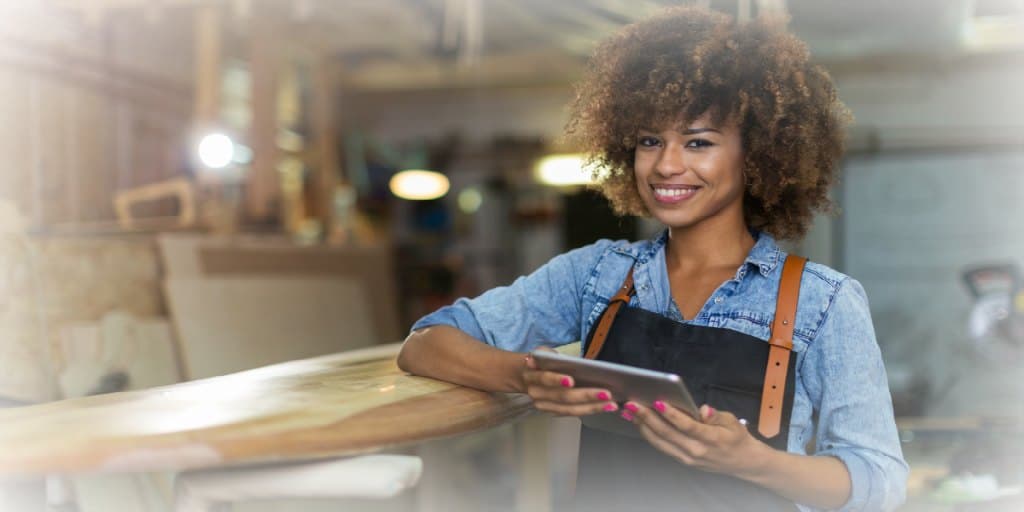 a woman in the shop of her hobby business 