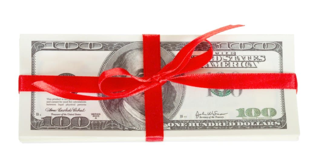 Pack of dollars wrapped as a gift earned as a bank bonus