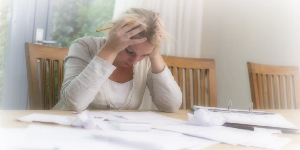 women stressed out by debt considering bankruptcy 2