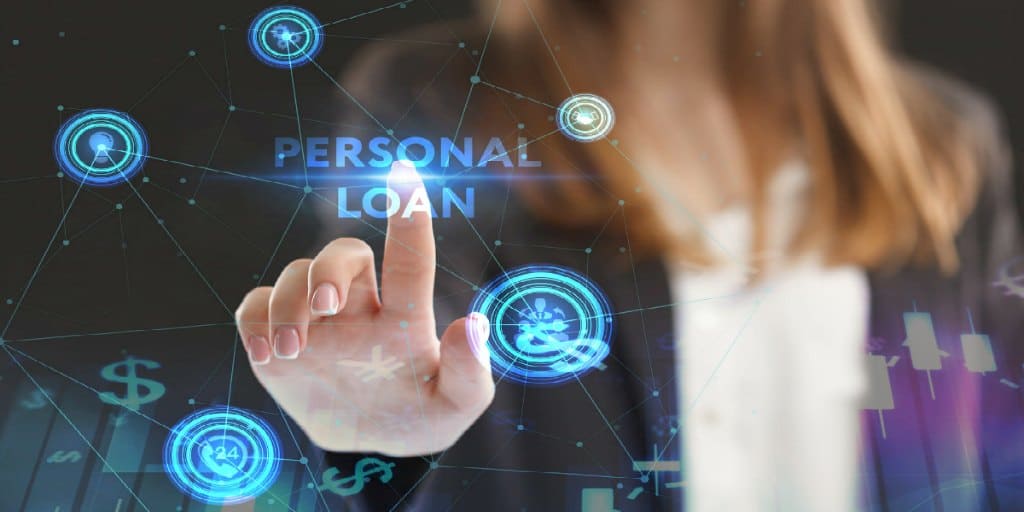 women using a touch screen ready to press on a personal loan icon