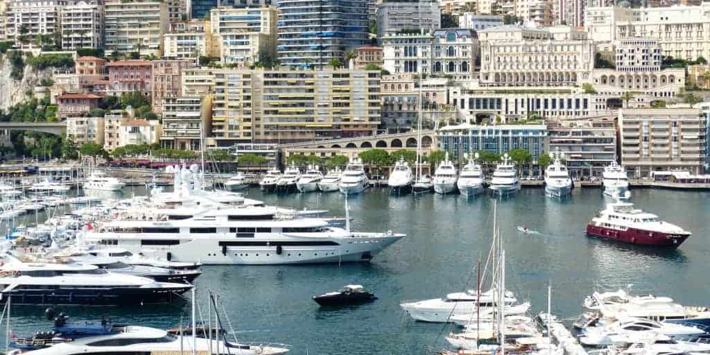 boats and yachts of the rich and wealthy docked in a bay