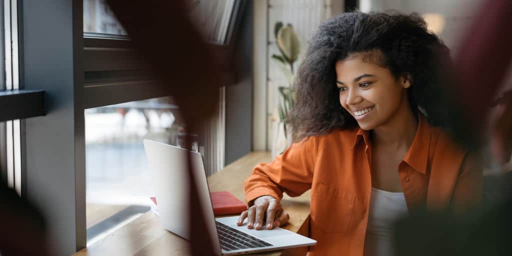 young woman working remotely from her home