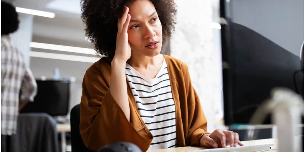 woman stressed at work and ready to quit her job