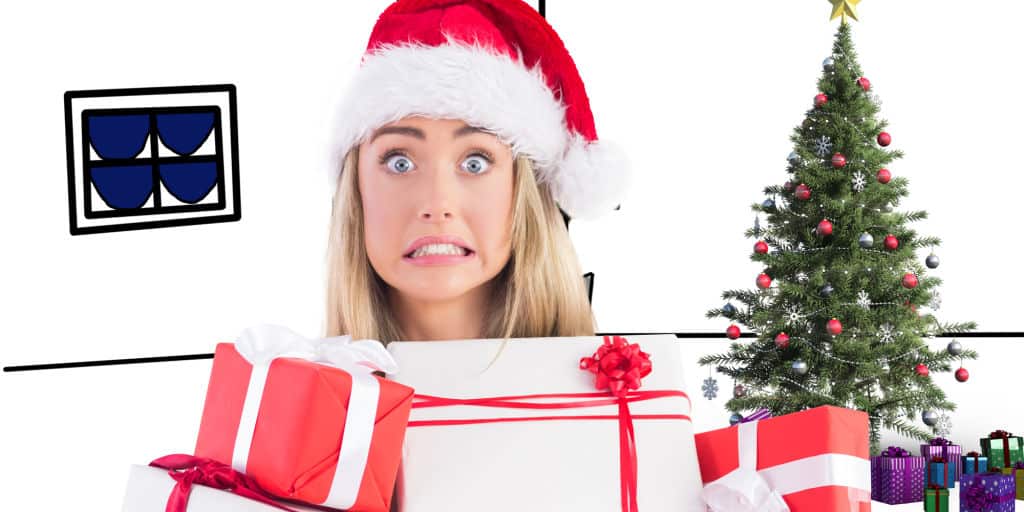 Festive blonde holding pile of gifts against living room sketch at christmas