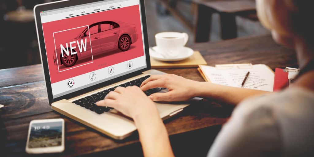 woman buying a new car online